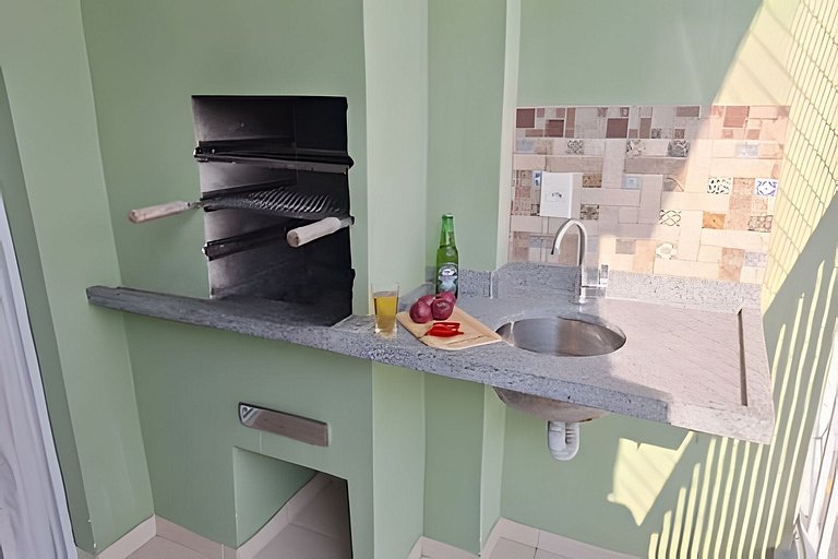 Apartamento com piscina e churrasqueira