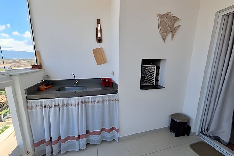 Apto com churrasqueira na varanda a 600 m do mar