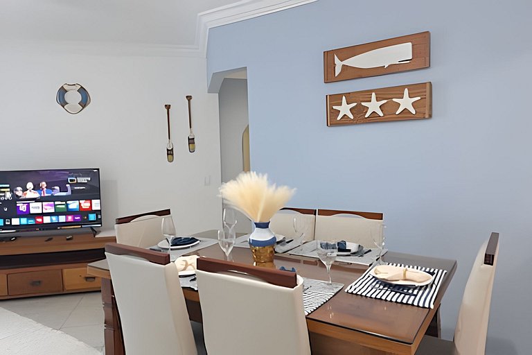 Apto c/ varanda e churrasqueira frente mar