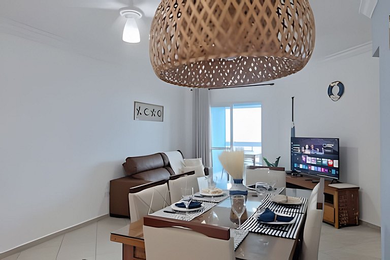 Apto c/ varanda e churrasqueira frente mar